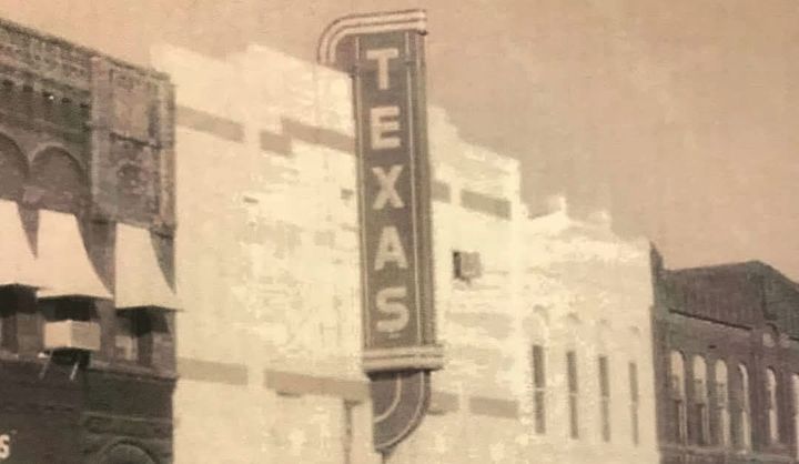 A historical photo of the Texas Theater in downtown Waxahachie.