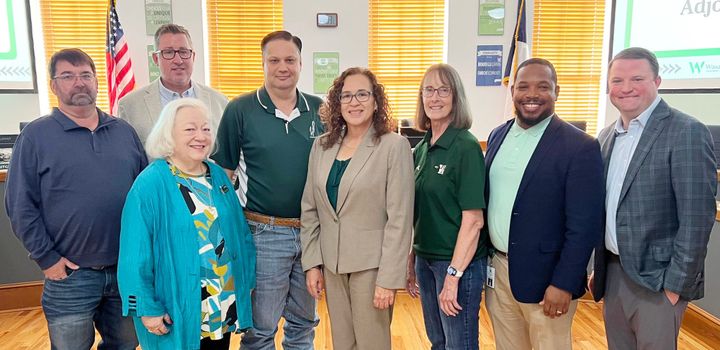 A photo of the Waxahachie ISD board members and their lone finalist for superintendent.