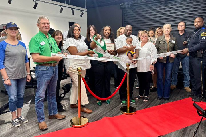 Photo of a ribbon cutting.
