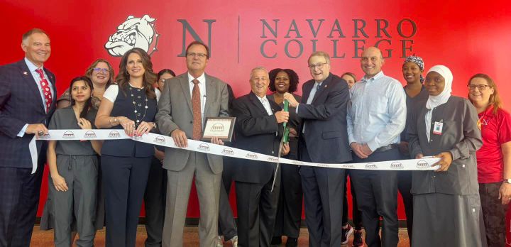 A ribbon cutting photo.