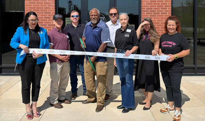 Photo of a ribbon cutting ceremony.