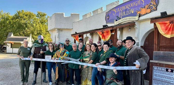 Photo of a ribbon cutting.