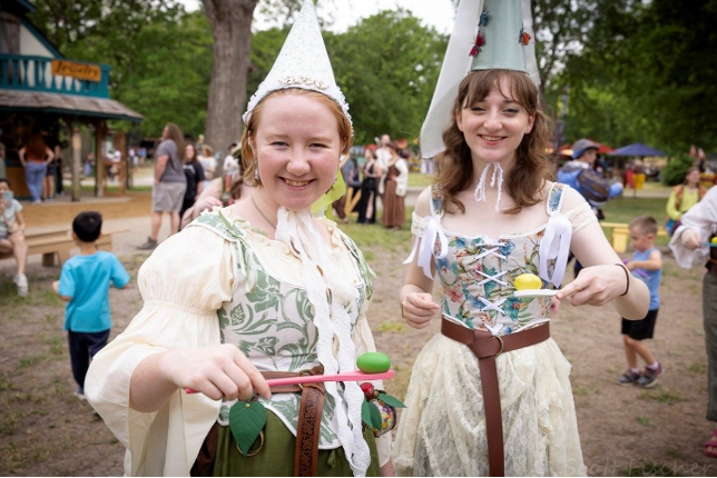 Two girls in themed attire at Scarborough Renaissance Festival. 