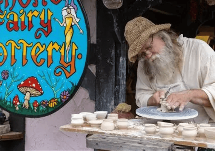 Photo of a potter at his wheel.