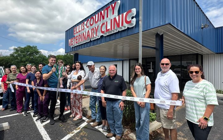 Photo of a ribbon cutting.
