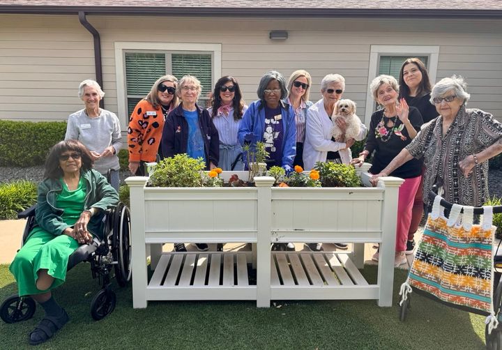 Independent living facility residents are shown by a raised flowerbed.