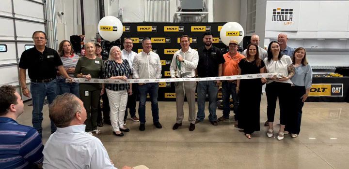Ribbon cutting for Holt Cat.