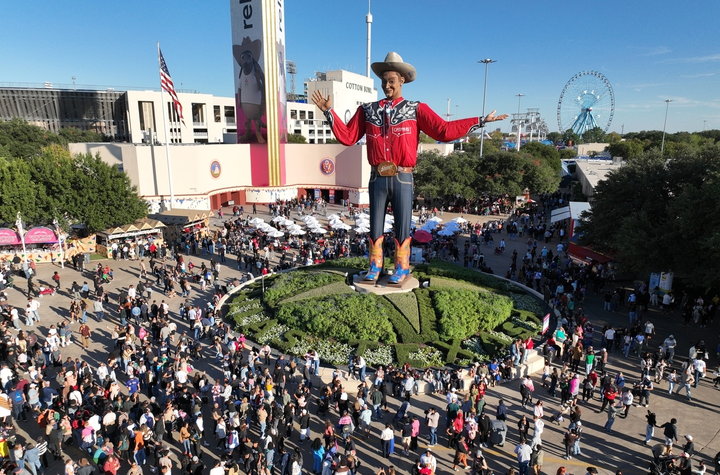 The State Fair of Texas' iconic Big Tex is shown welcoming crowds to the annual event. 