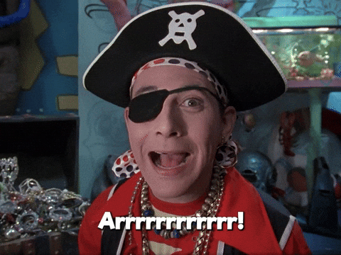 Pee Wee Herman dressed as a pirate saying "Arrrrrrrrrrr!"