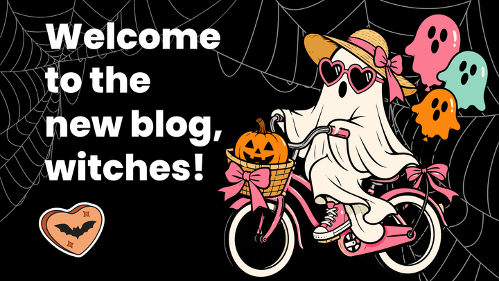Ghost with heart sunglasses on riding a pink bike with ghost balloons on the back and the words, "Welcome to the new blog, witches!"