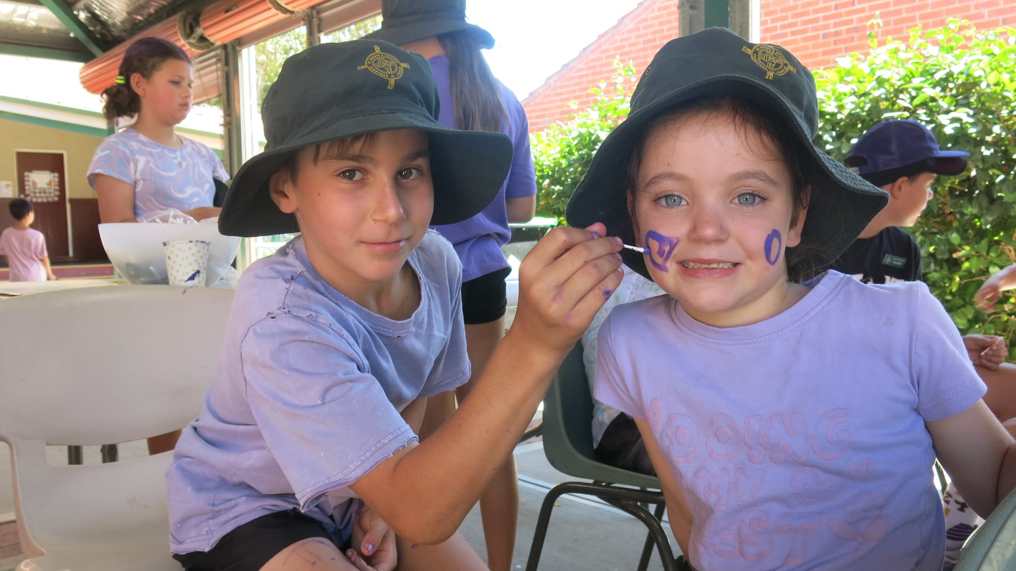 Students pop on purple to fight poverty
