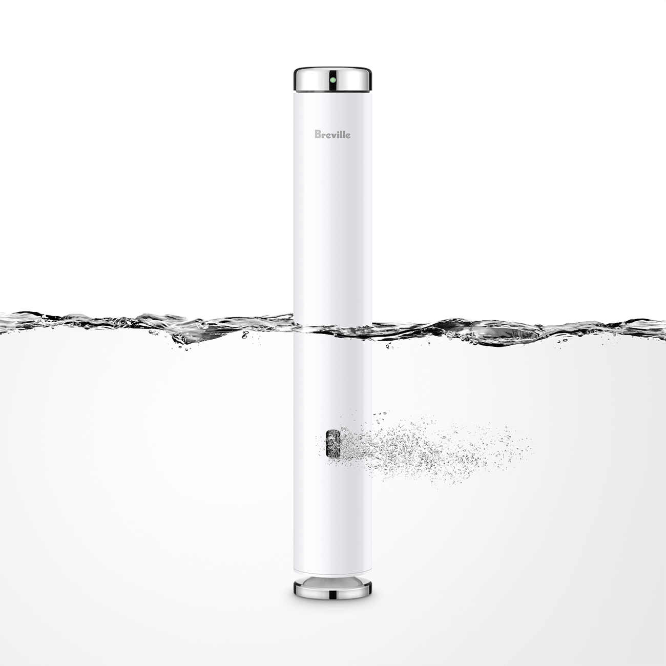 A tall, narrow white cylinder is half immersed in water. Water is seen jetting out of an opening a few inches up from the base.