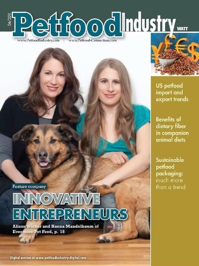 Cover of Petfood Industry magazine with Alison, Hanna, and dog Connor on the front