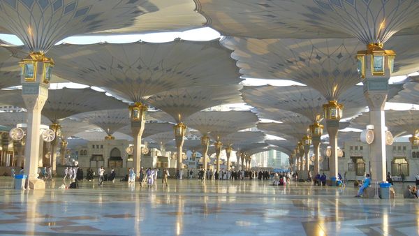 The courtyard of the Prophet's Mosque in Madina under its opened shade umbrellas