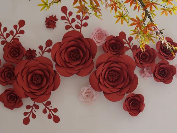 Red paper flowers with nested petals.