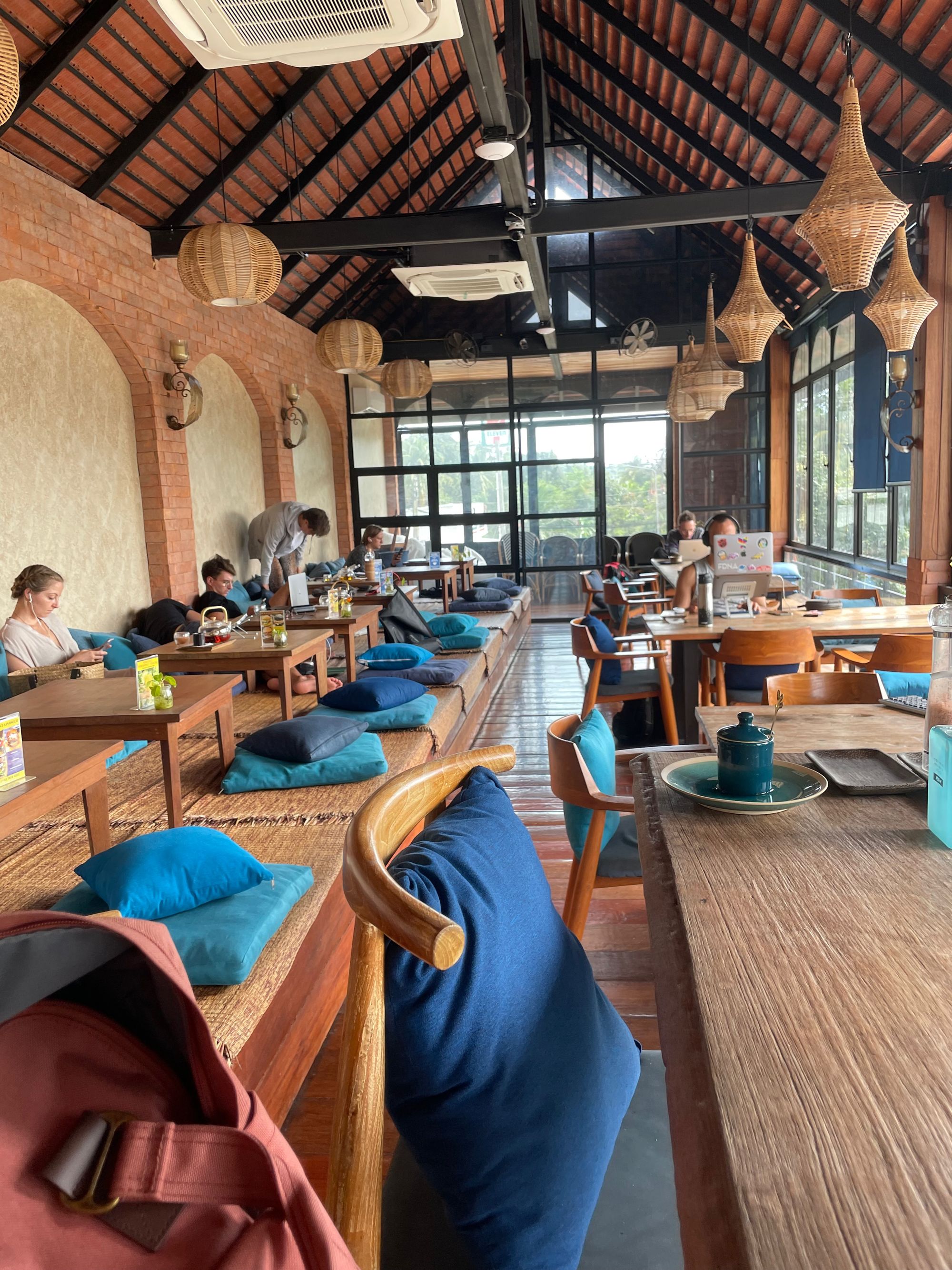 A cafe full of digital nomads working online