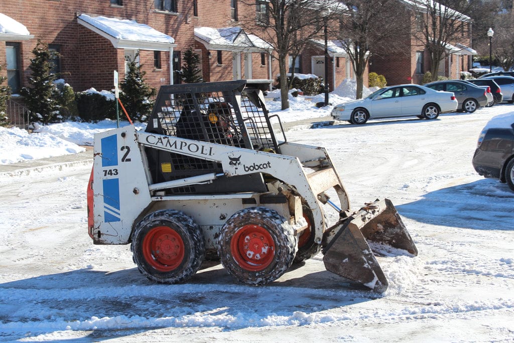 J. Campoli & Sons Bobcat performing sidewalk service in Englewood, NJ