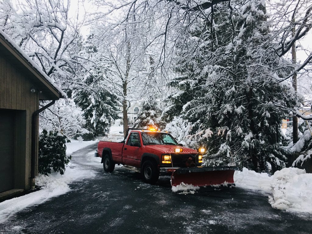 A home receiving comprehensive snow plowing service from J. Campoli & Sons