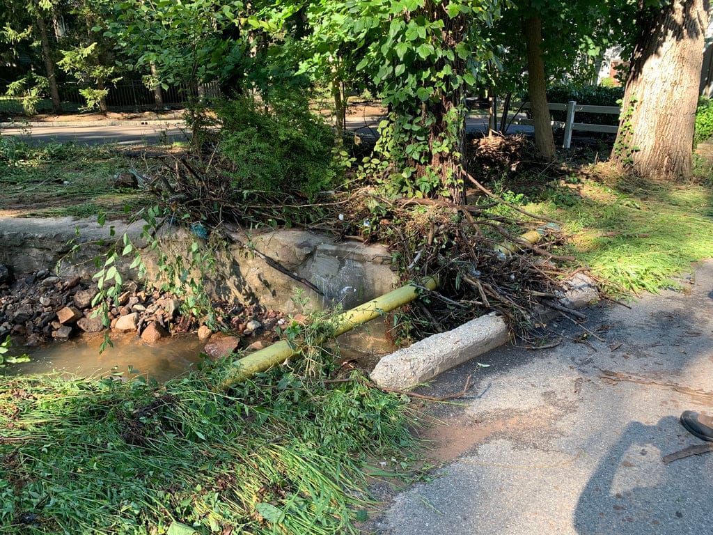 A drainage culvert in Cresskill, NJ that was overwhelmed during a storm and created massive flooding