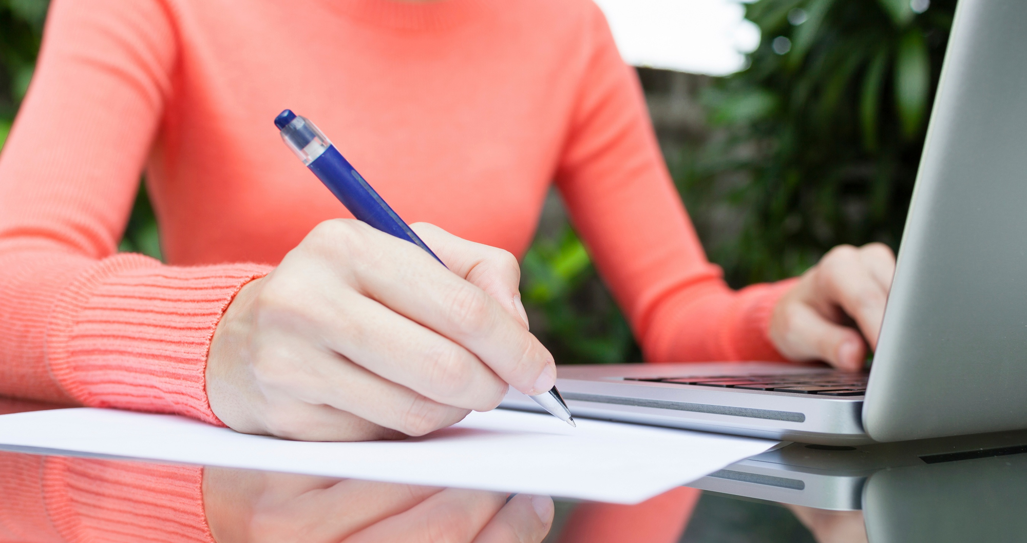 man writing with a pen - College App