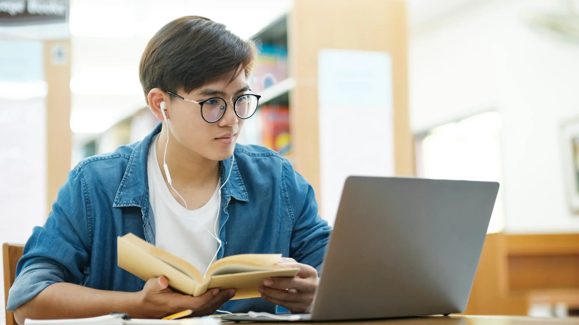 person with book - College Majors 