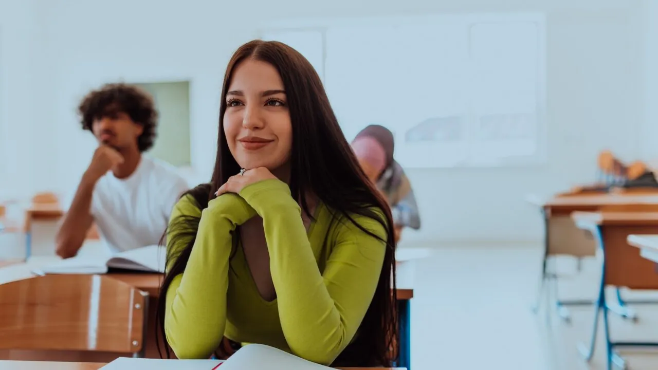 student focused in class - Easiest College Majors   