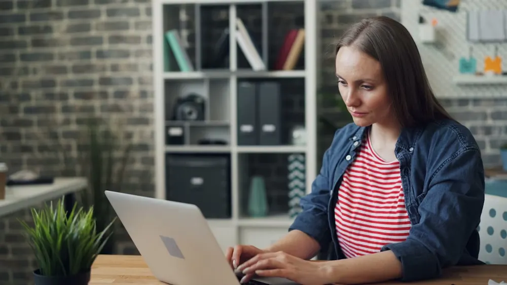 woman looking serious - Common App Essay Prompts