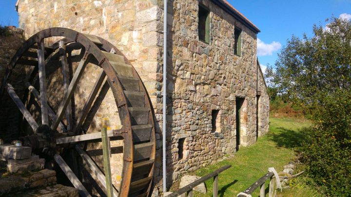 An 18th century Alderney watermill is turning again, its story has inspired a new set of stamps