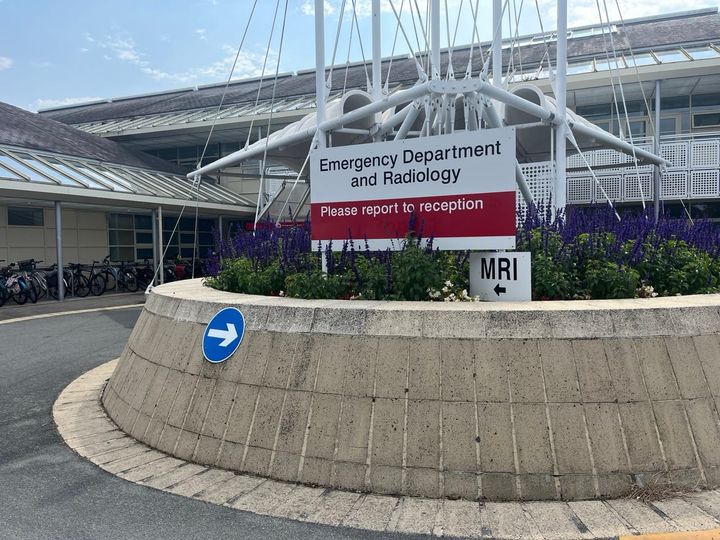 Outside the Princess Elizabeth Hospital with signs showed the Emergency Department and Radiology.