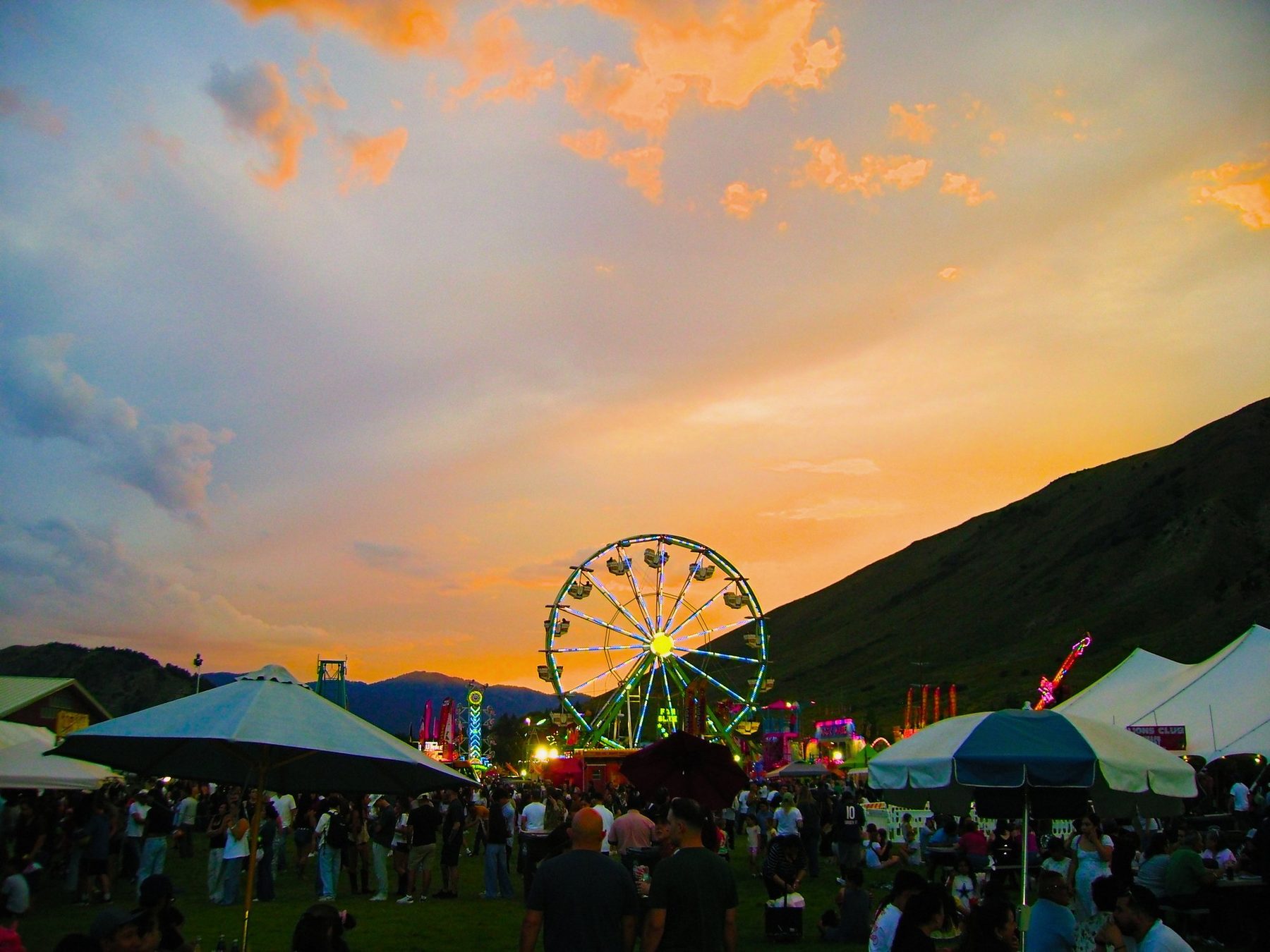 From Kara Hobby’s Wilson Mom summer: ferris wheel at a summer fair at sunset