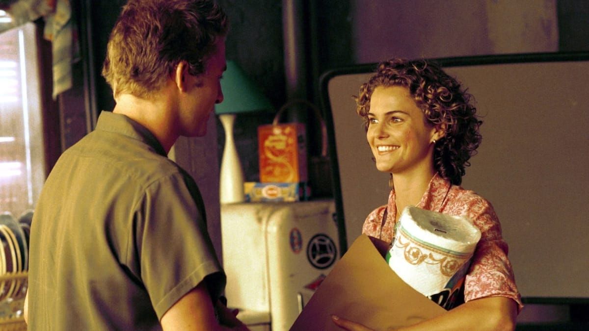 Image of Scott Speedman as Ben and Keri Russell as Felicity in a scene from the 'Felicity' episode, 'The Christening.'
