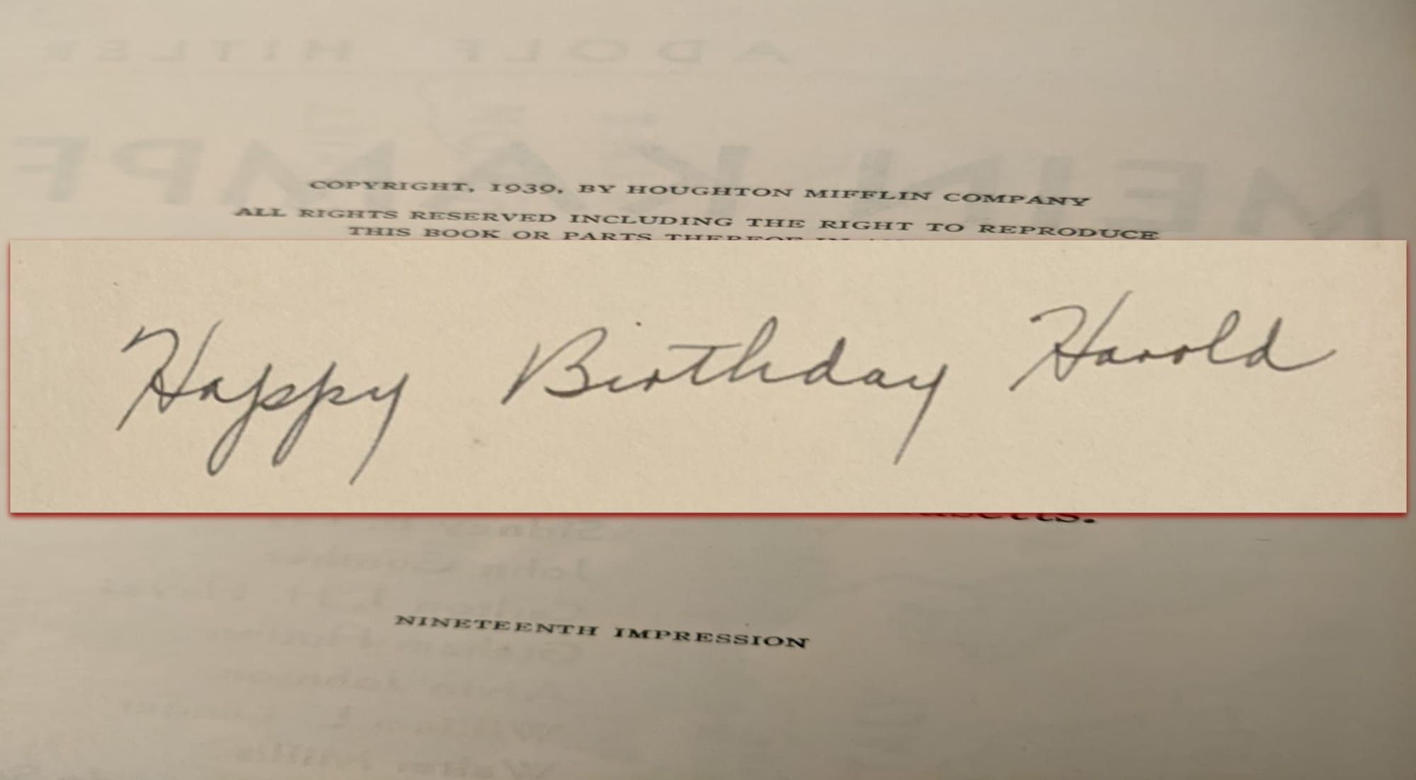 Graphic of the handwritten words "Happy Birthday Harold" overlaid on the image of a book page.
