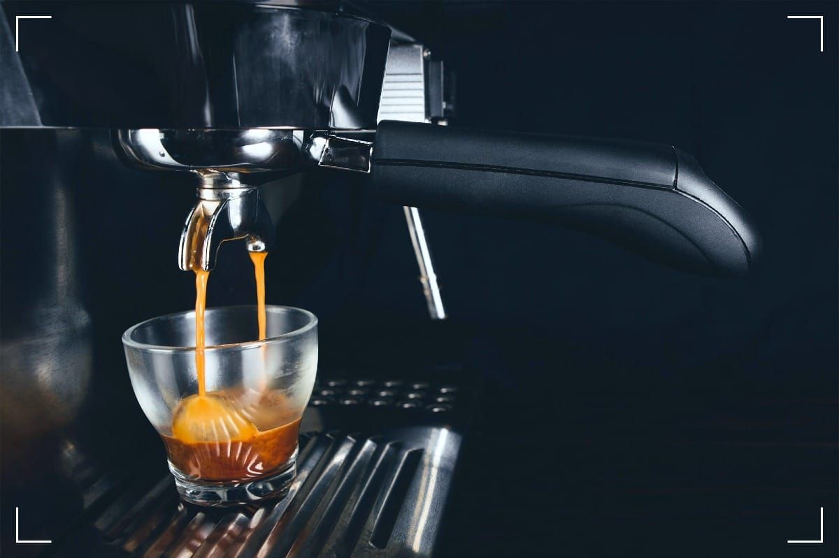 An espresson machine making a cup of coffee.