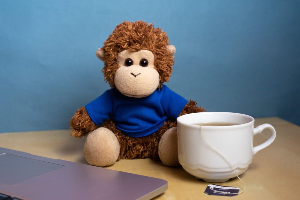 Bob T. Monkey powers through the afternoon with a cup of tea