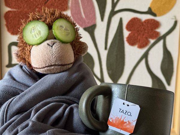 Bob is basking in a robe with cucumber slices on his eyes and a warm cup of tea next to him
