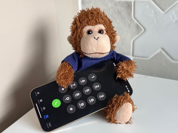 Bob about to make a phone call on his iPhone.