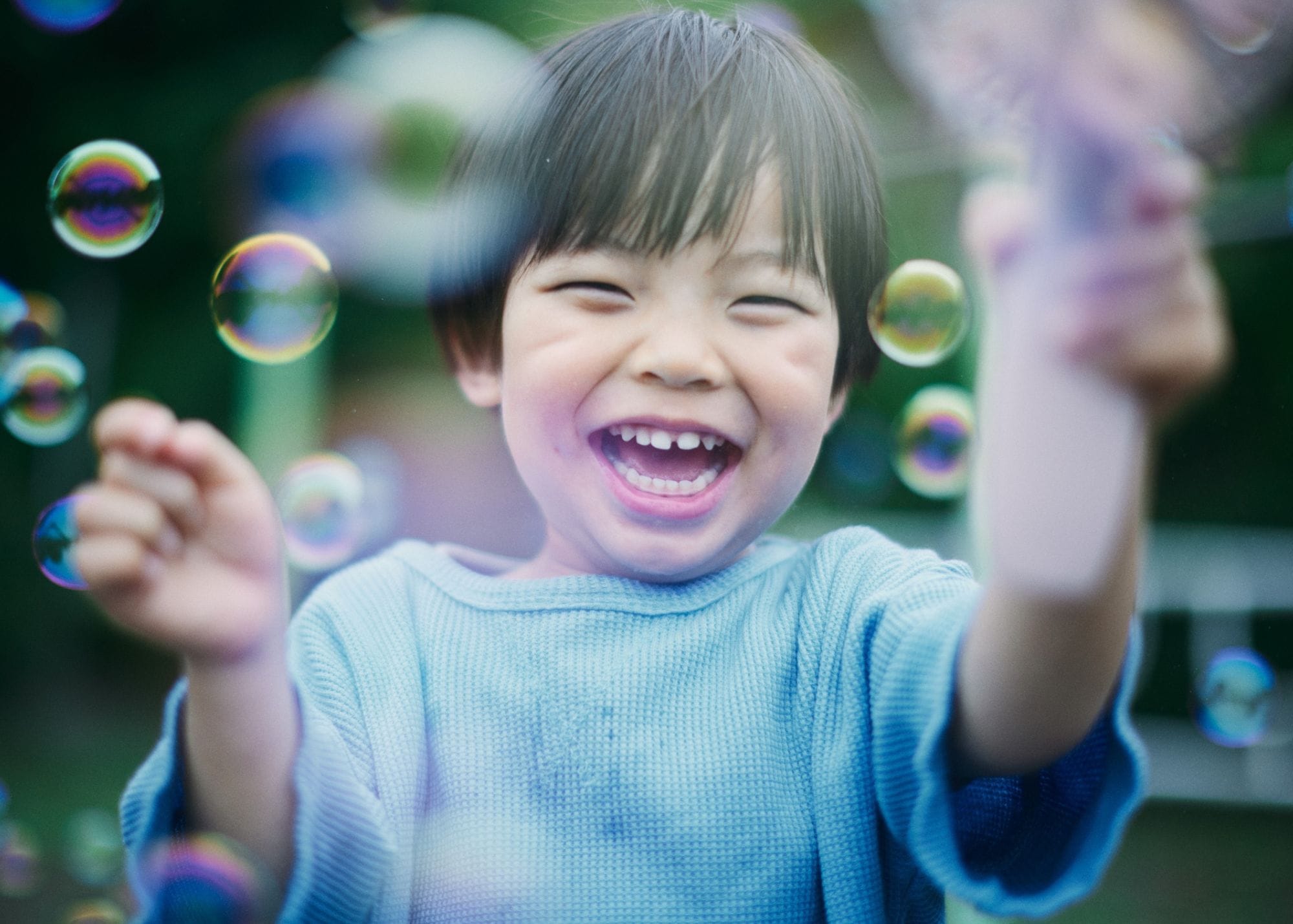 child playing with bubbles.jpg