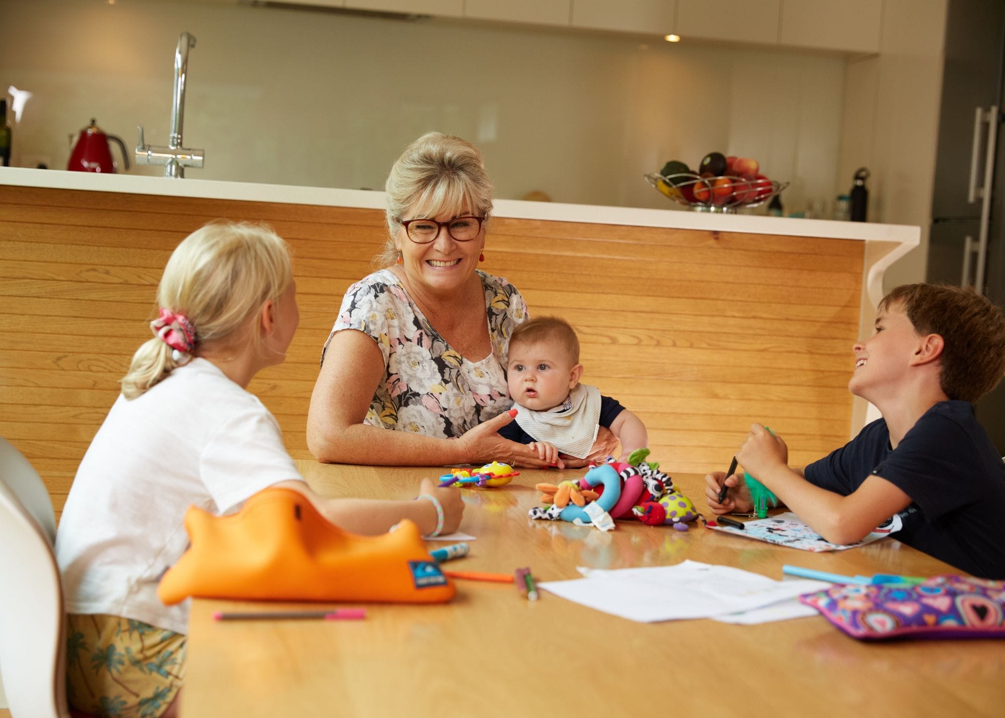nanny at table with kids.jpg