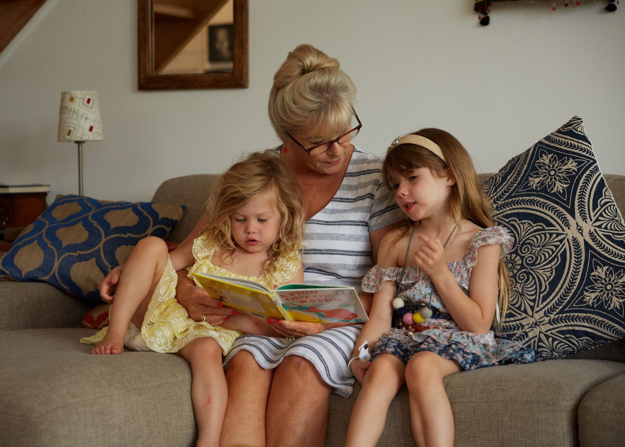 nanny reading book to kids.jpg