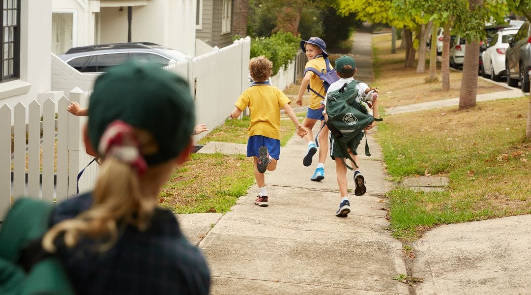 Bronte school children running to babysitter