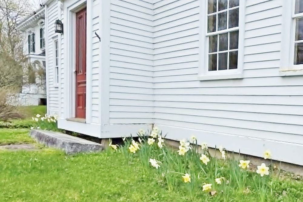 Historic Holmes  Cottage Preparing for  Summer Visitors