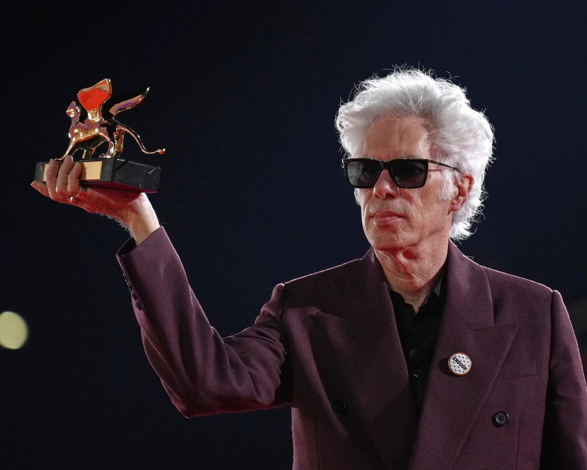 Director Jim Jarmusch holds his Golden Lion award from the Venice Film Festival.