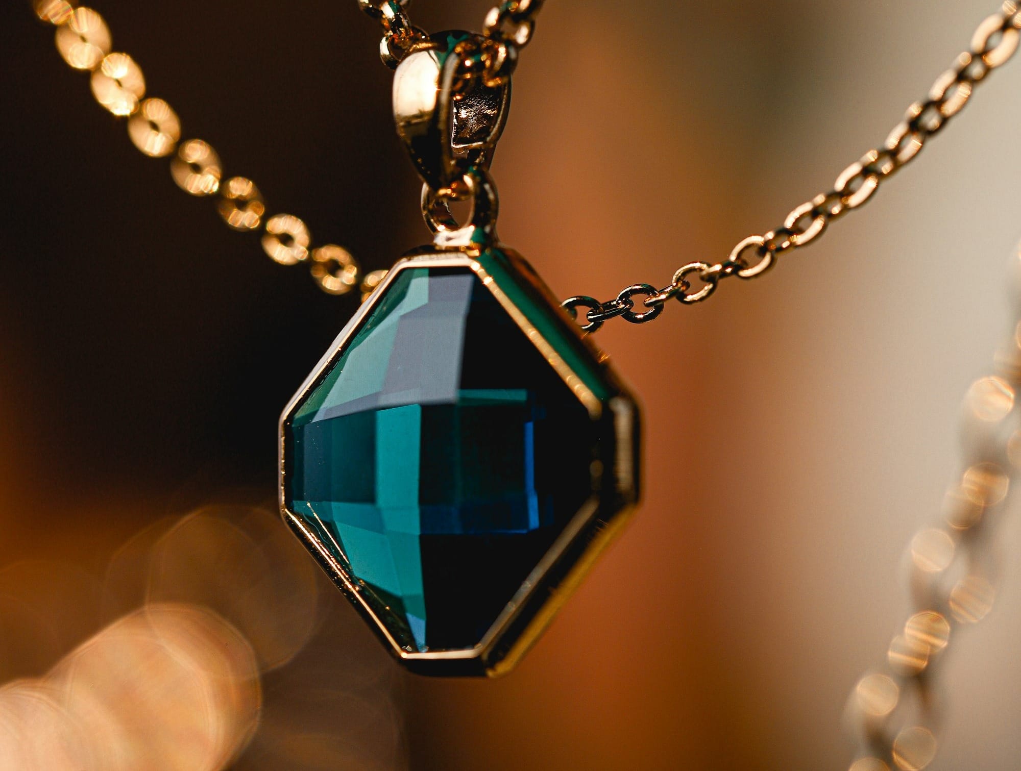 silver and blue gemstone pendant necklace