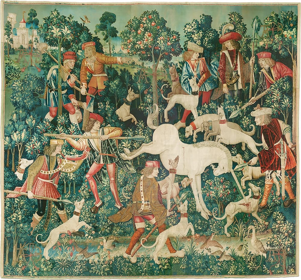 an intricate tapestry showing a unicorn stabbing a dog with its horn, while defending itself against hunters