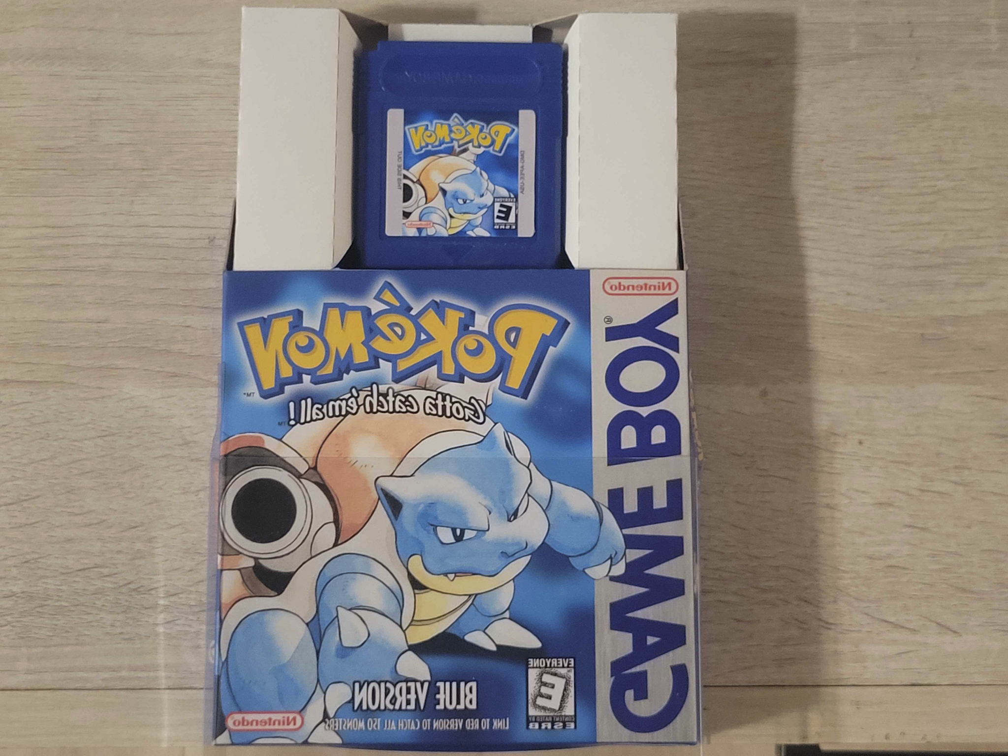 Restored Pokémon Blue cartridge and box