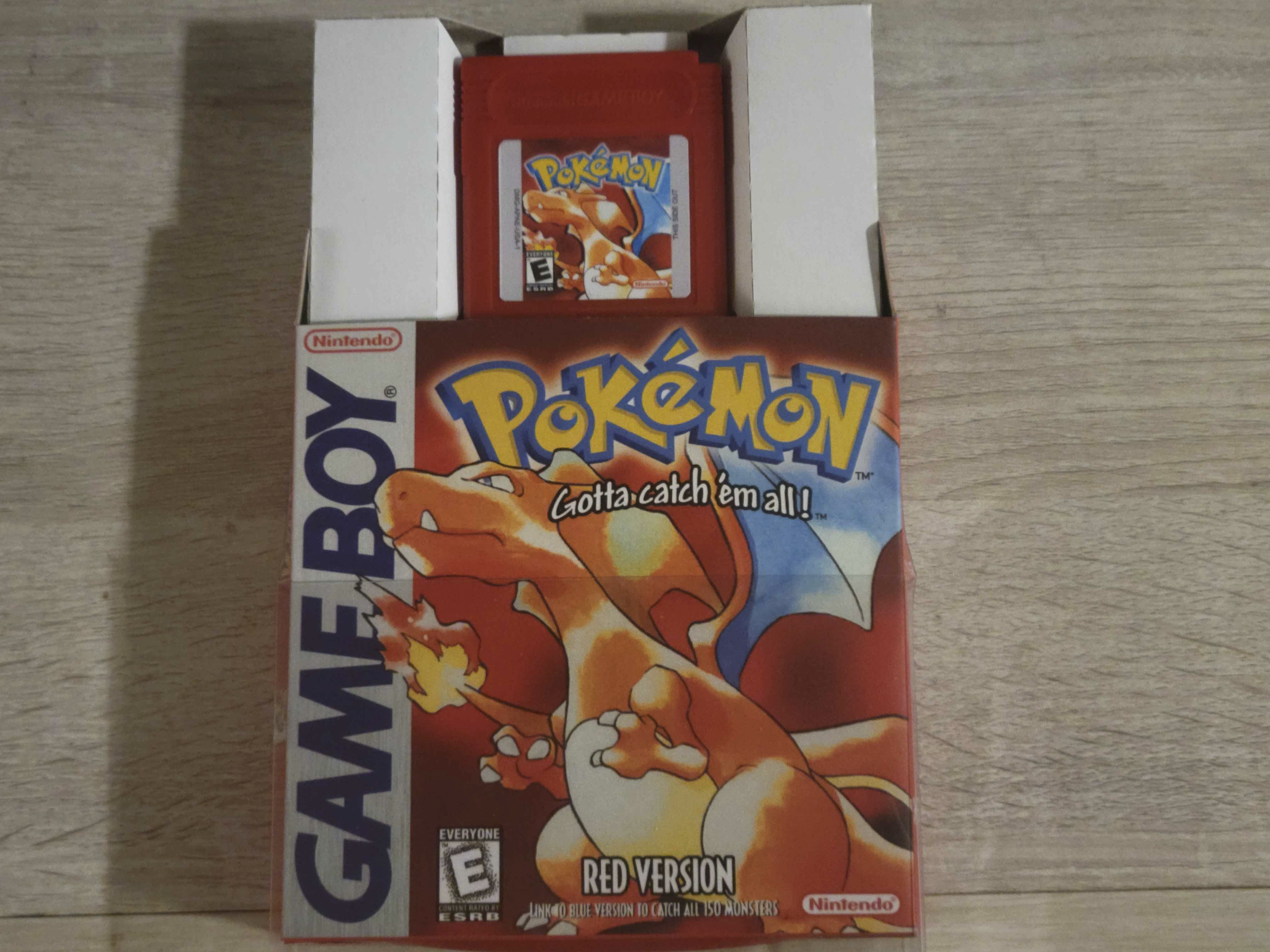 Restored Pokémon Red cartridge and box