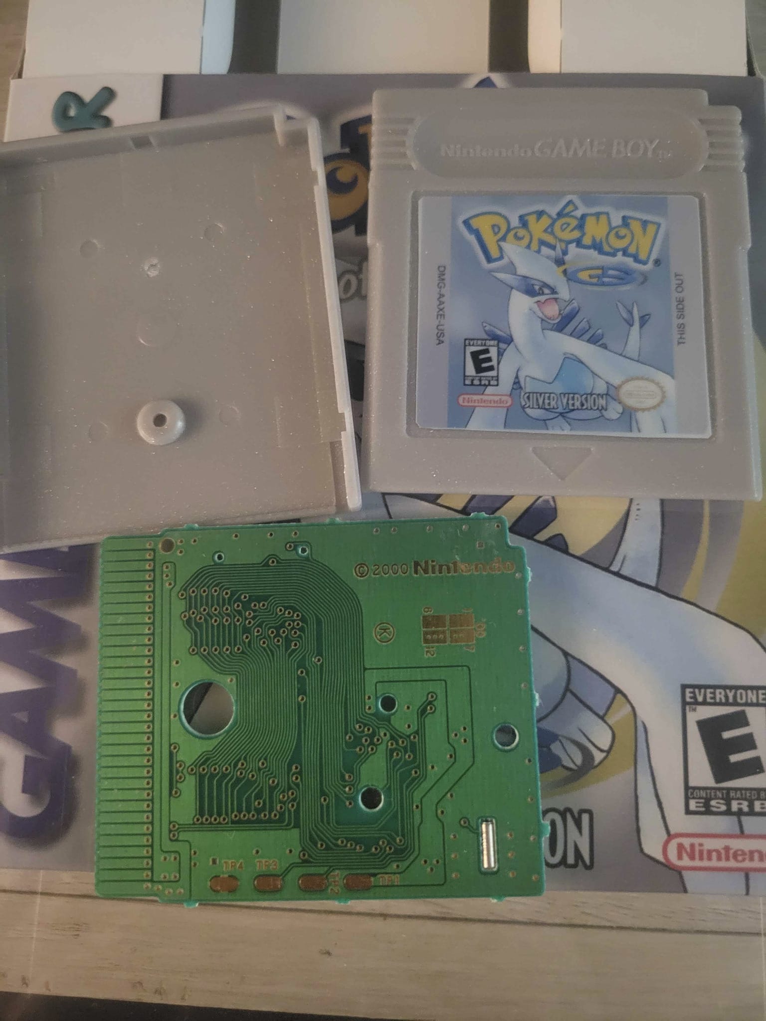 Pokémon Silver shell, cartridge, and cleaned PCB