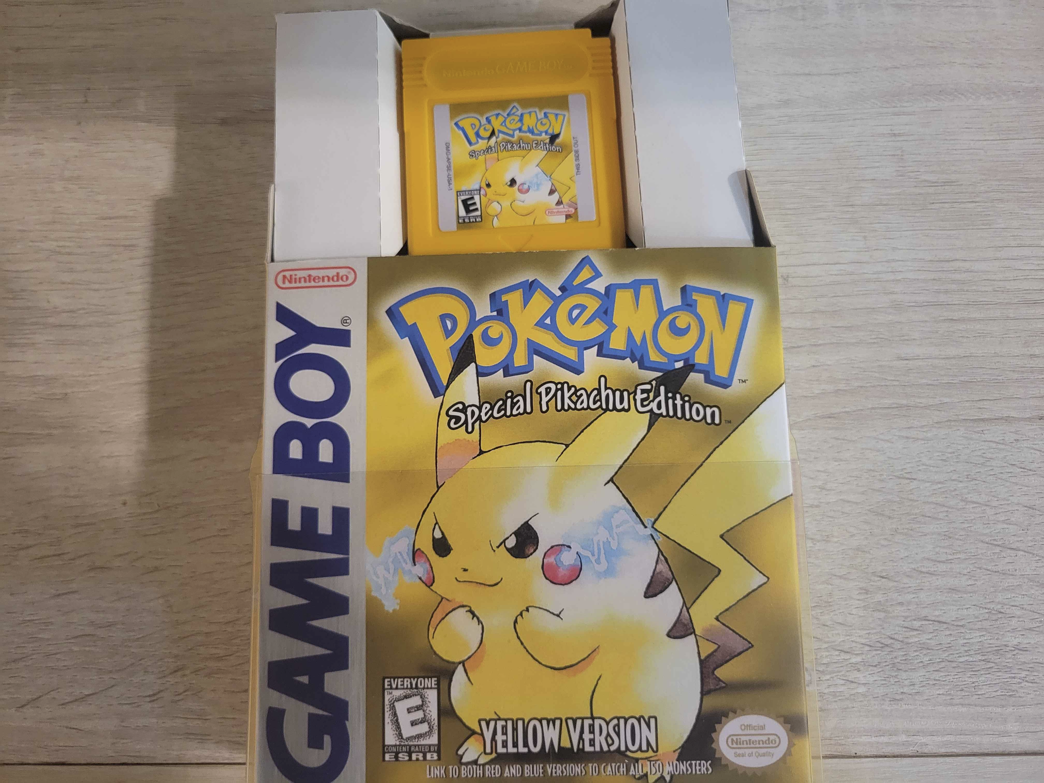 Restored Pokémon Yellow cartridge and box