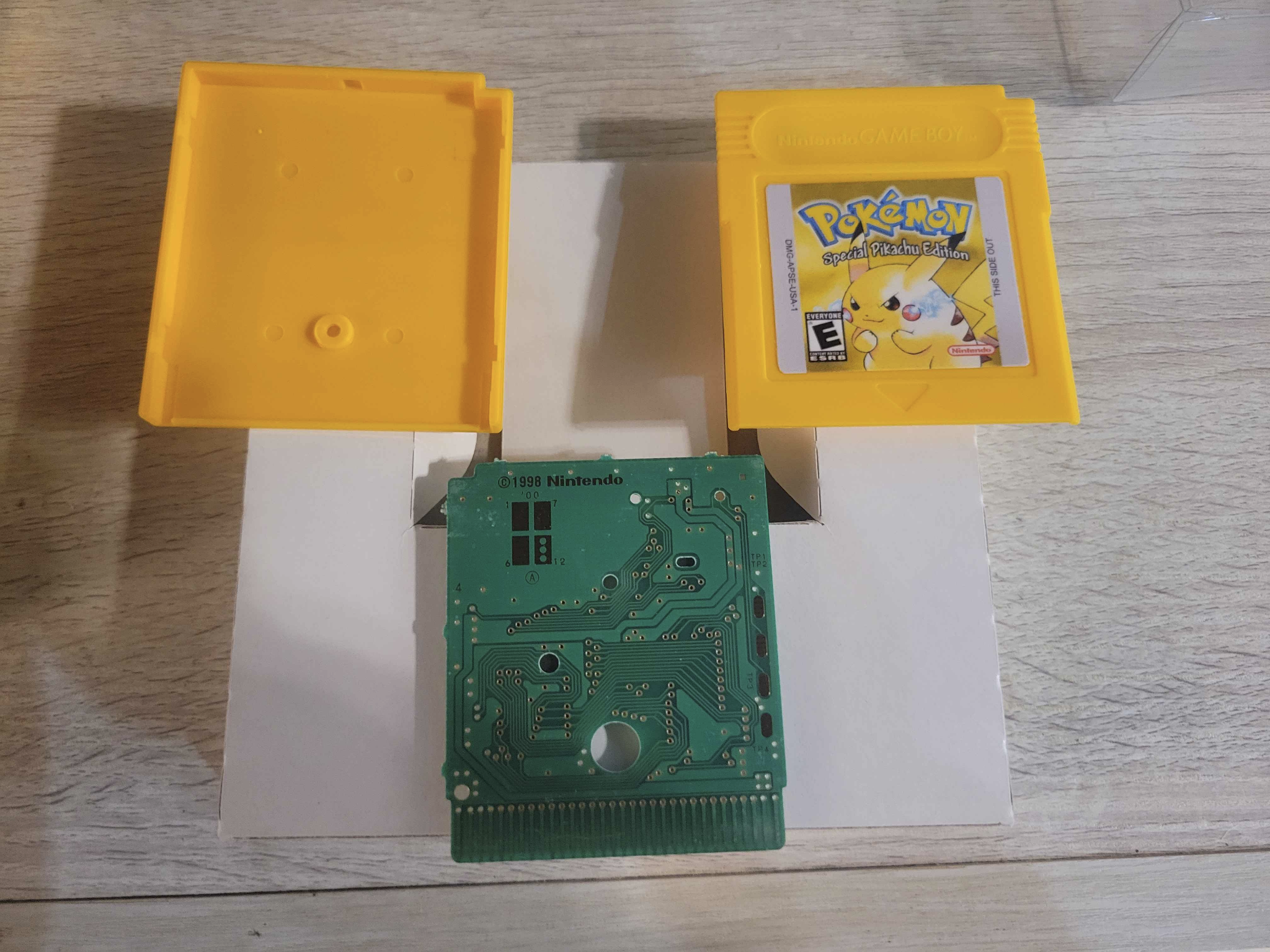 Pokémon Yellow shell, cartridge, and cleaned PCB