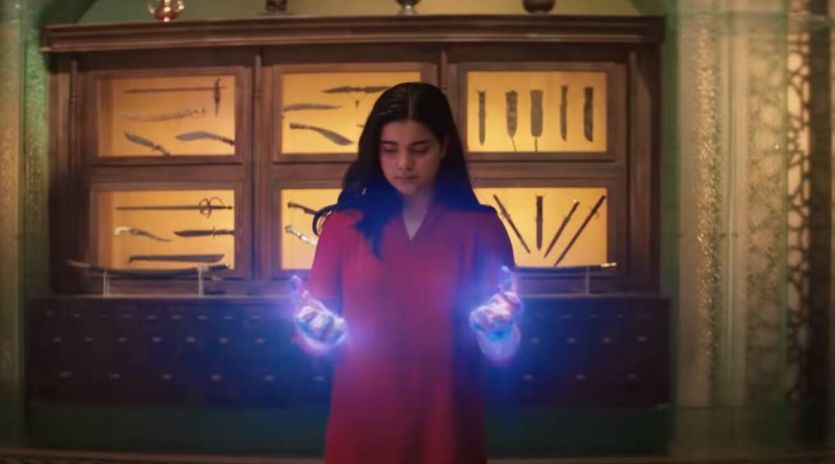 Iman Vellani's hands get all glowy in a still from MS. MARVEL.